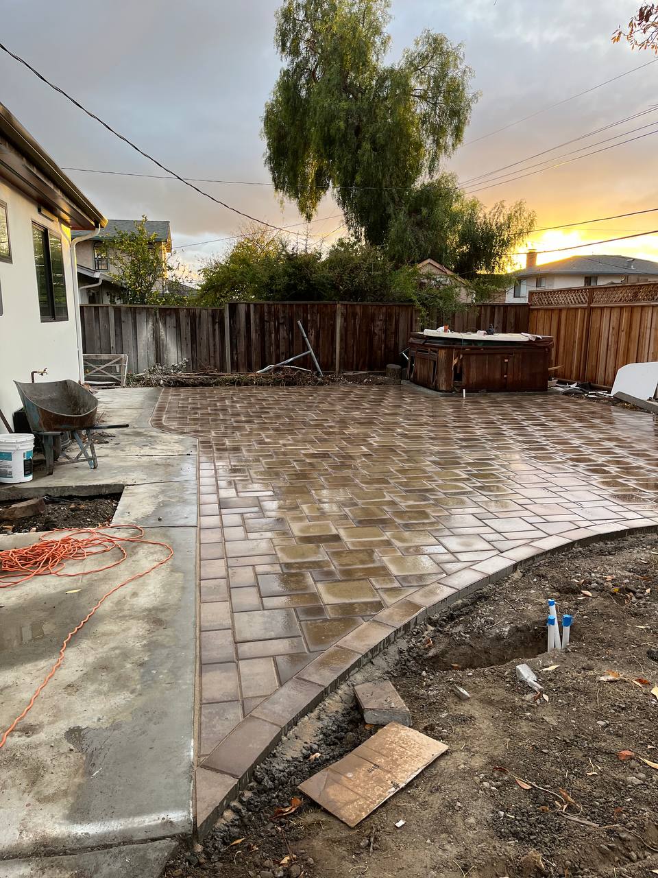 Custom pattern paver patio at sunset